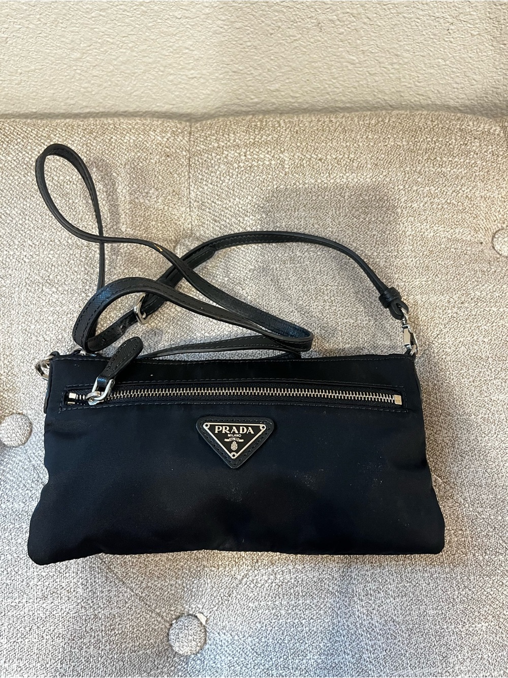PRADA NYLON FLAT CROSSBODY POUCH.